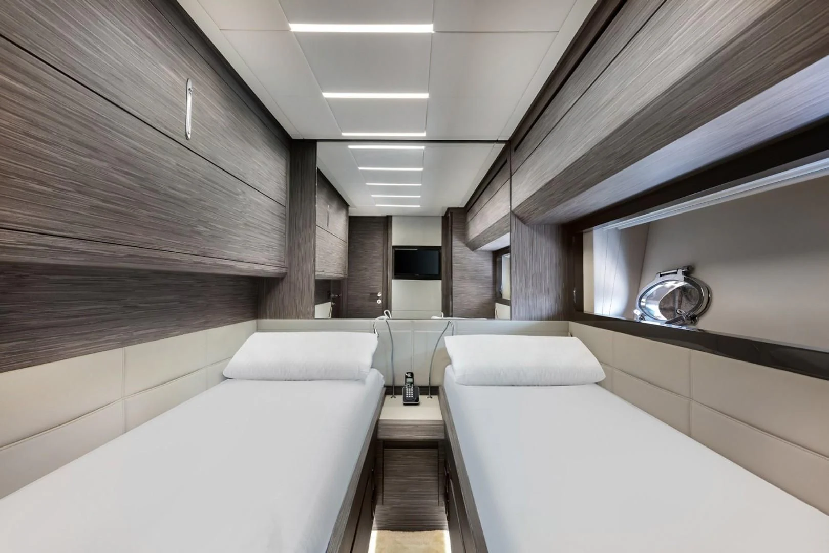 a room with a bed and a bathtub aboard AFRICAN WILD DOG Yacht for Sale