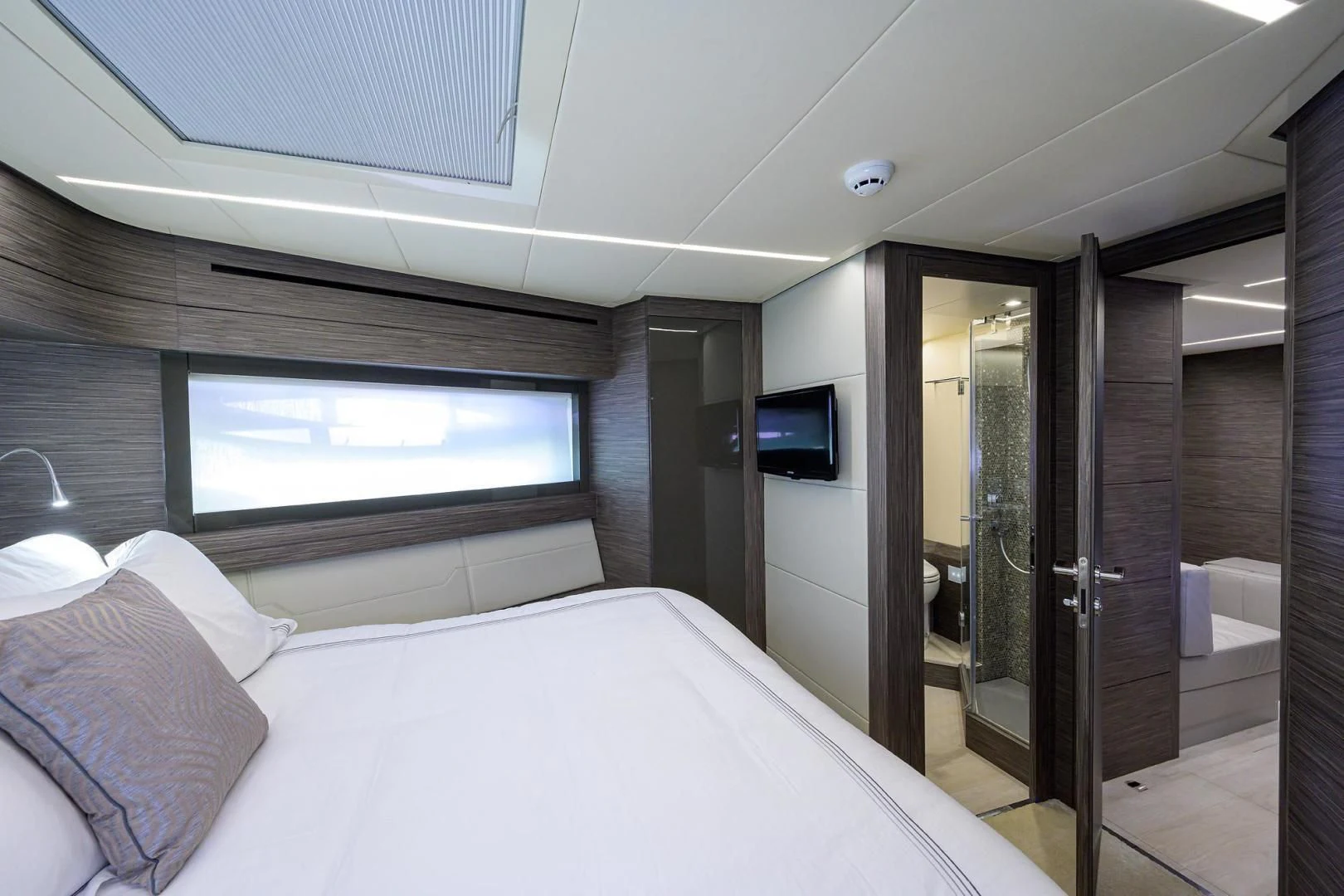 a bed in a room aboard AFRICAN WILD DOG Yacht for Sale