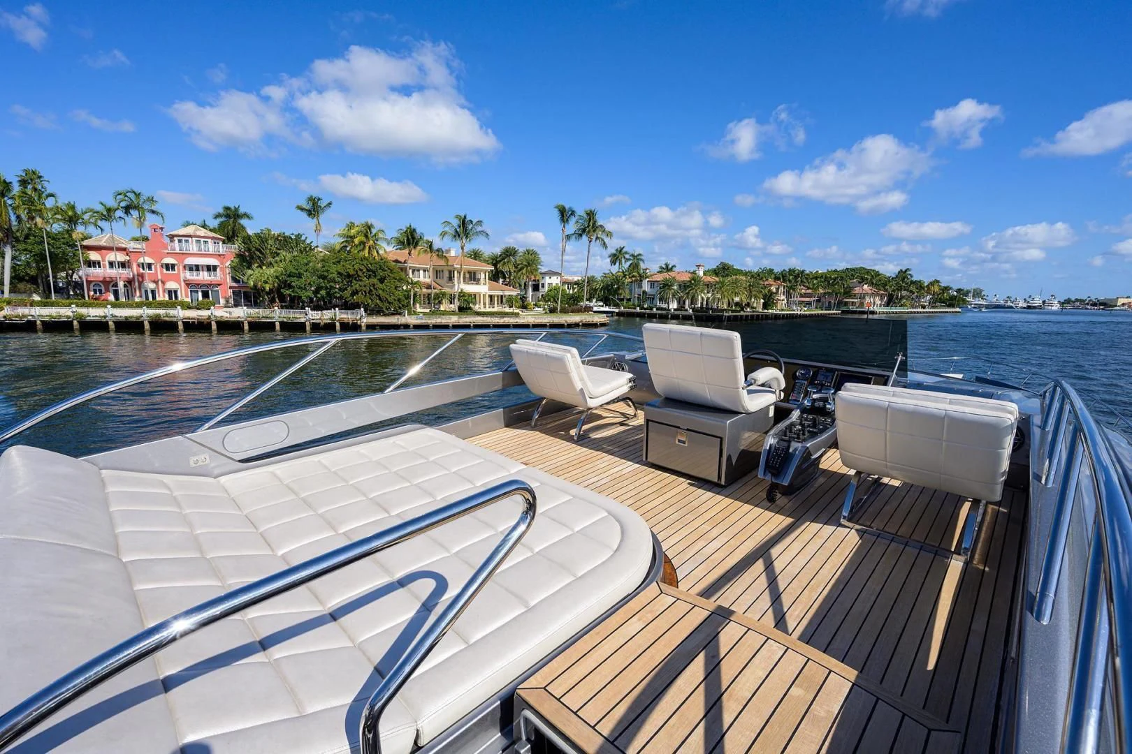 a deck with chairs and a pool aboard AFRICAN WILD DOG Yacht for Sale