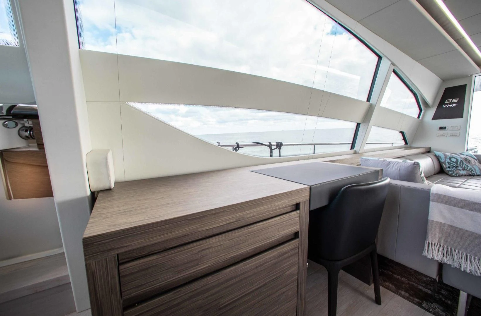a room with a bed and a window aboard AFRICAN WILD DOG Yacht for Sale