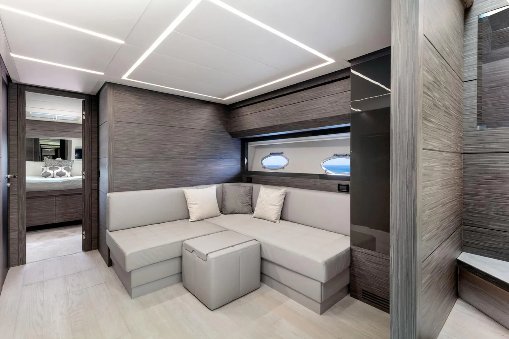 a room with a couch and a bed aboard AFRICAN WILD DOG Yacht for Sale