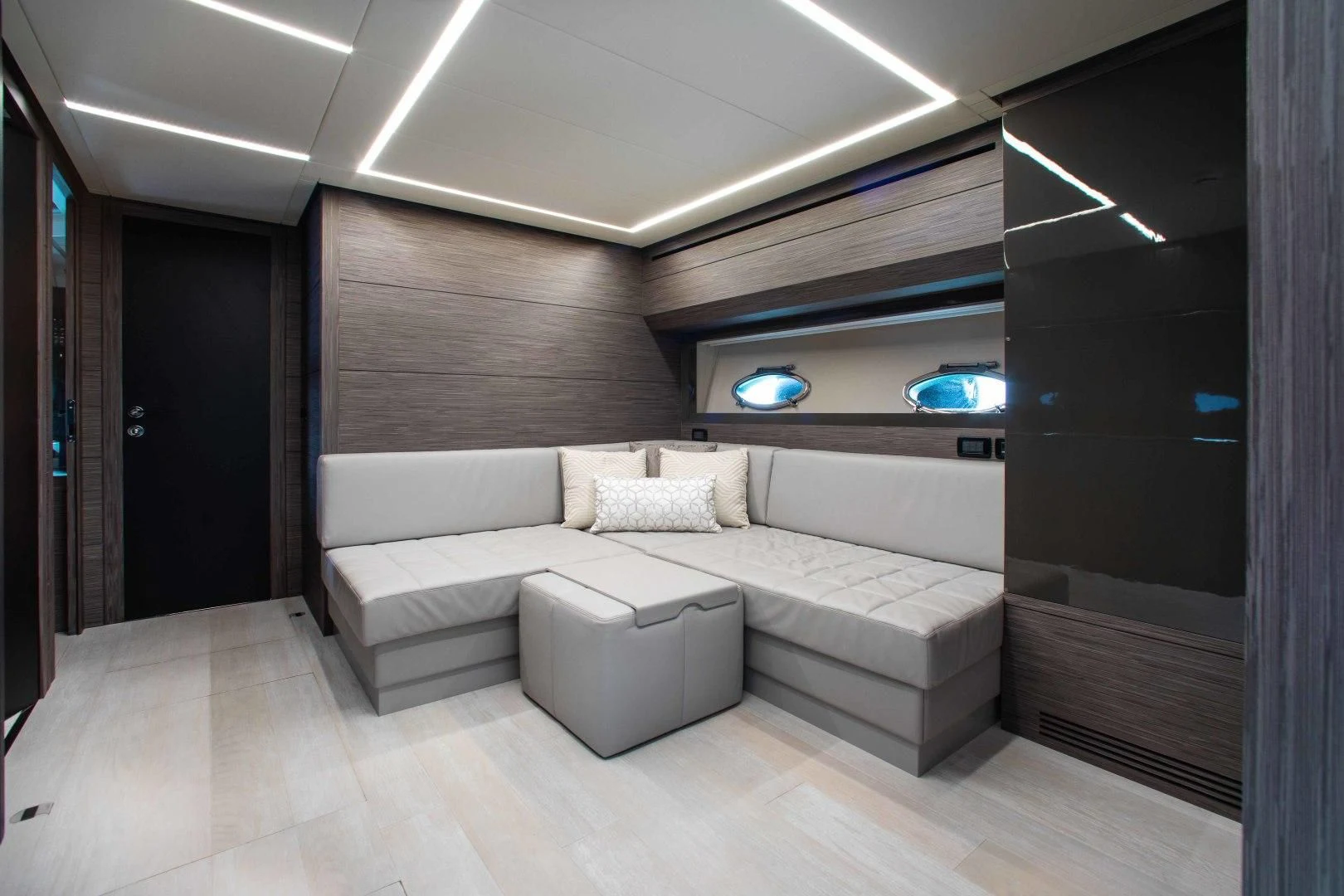 a modern looking room with a couch aboard AFRICAN WILD DOG Yacht for Sale