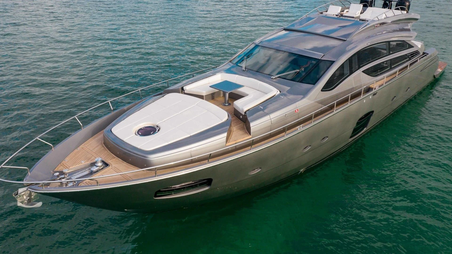 a white boat on the water aboard AFRICAN WILD DOG Yacht for Sale