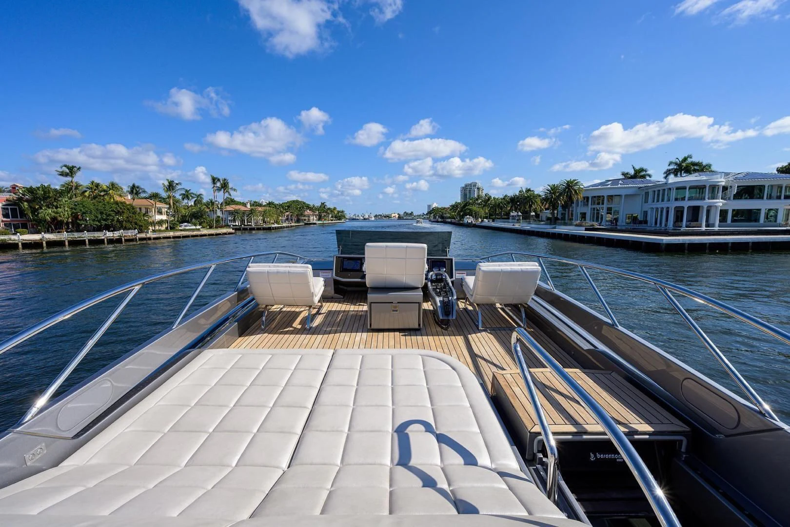 a deck with chairs on it aboard AFRICAN WILD DOG Yacht for Sale