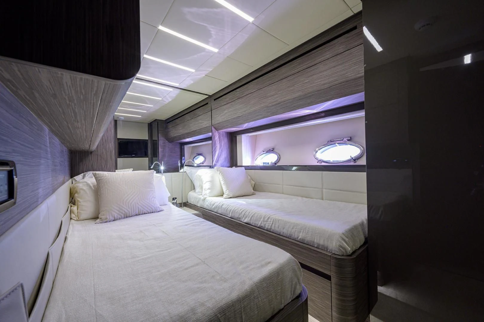 a room with two beds aboard AFRICAN WILD DOG Yacht for Sale