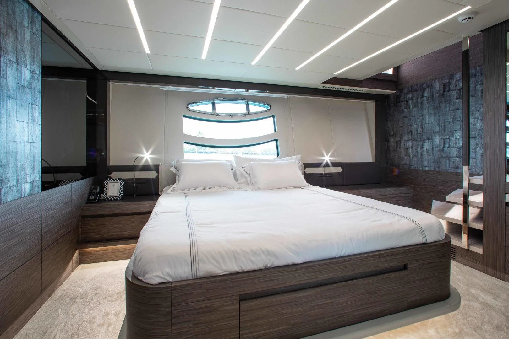 a bed in a room aboard AFRICAN WILD DOG Yacht for Sale