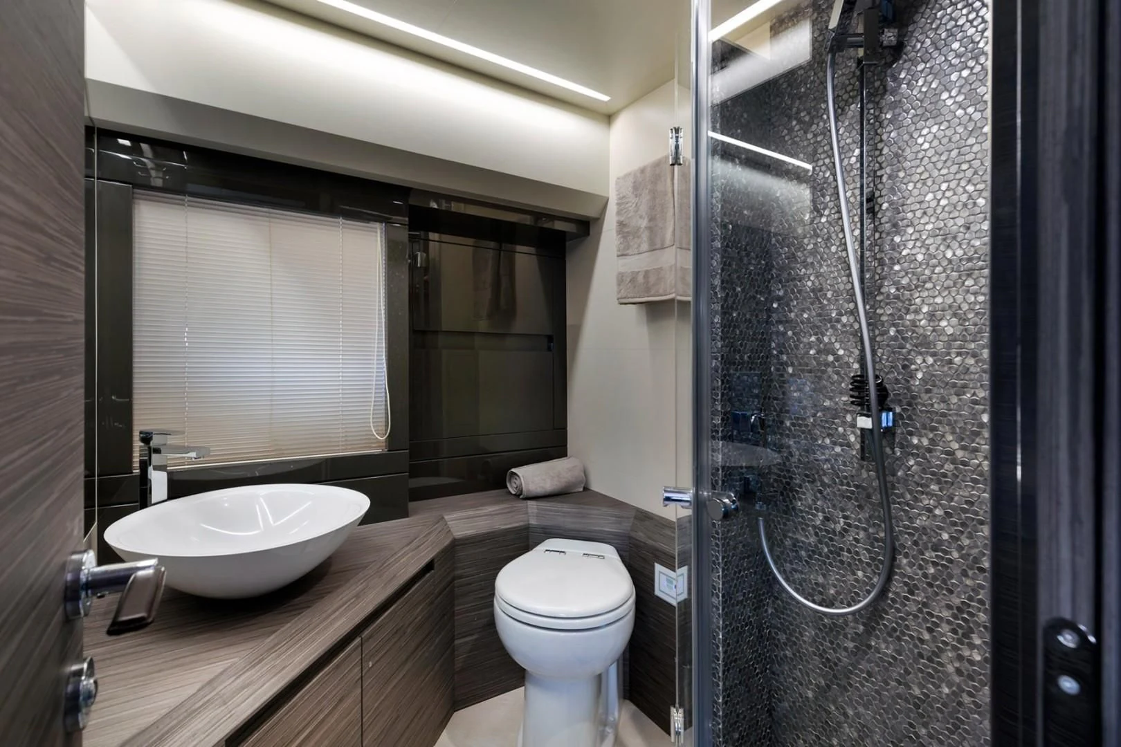 a bathroom with a sink and a toilet aboard AFRICAN WILD DOG Yacht for Sale