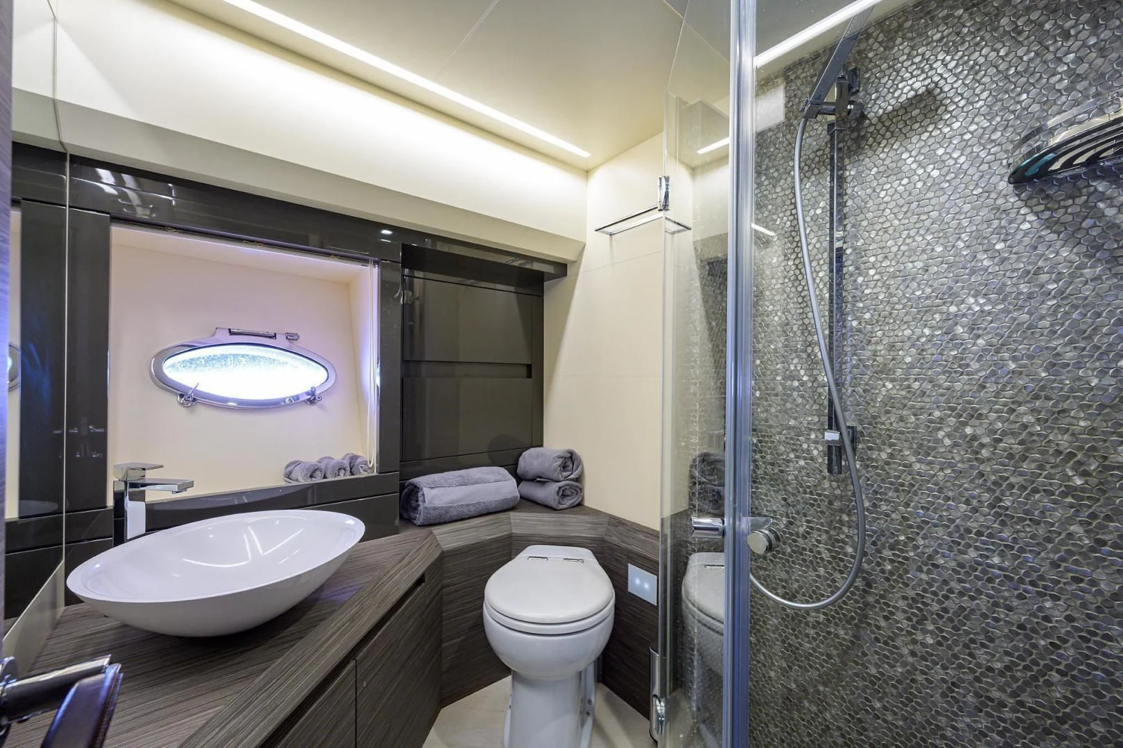 a bathroom with a large mirror aboard AFRICAN WILD DOG Yacht for Sale