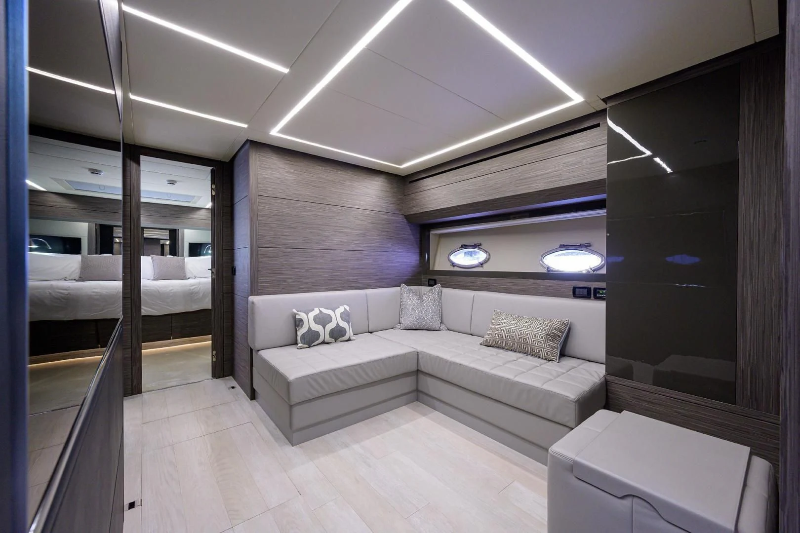a room with a bed and a couch aboard AFRICAN WILD DOG Yacht for Sale