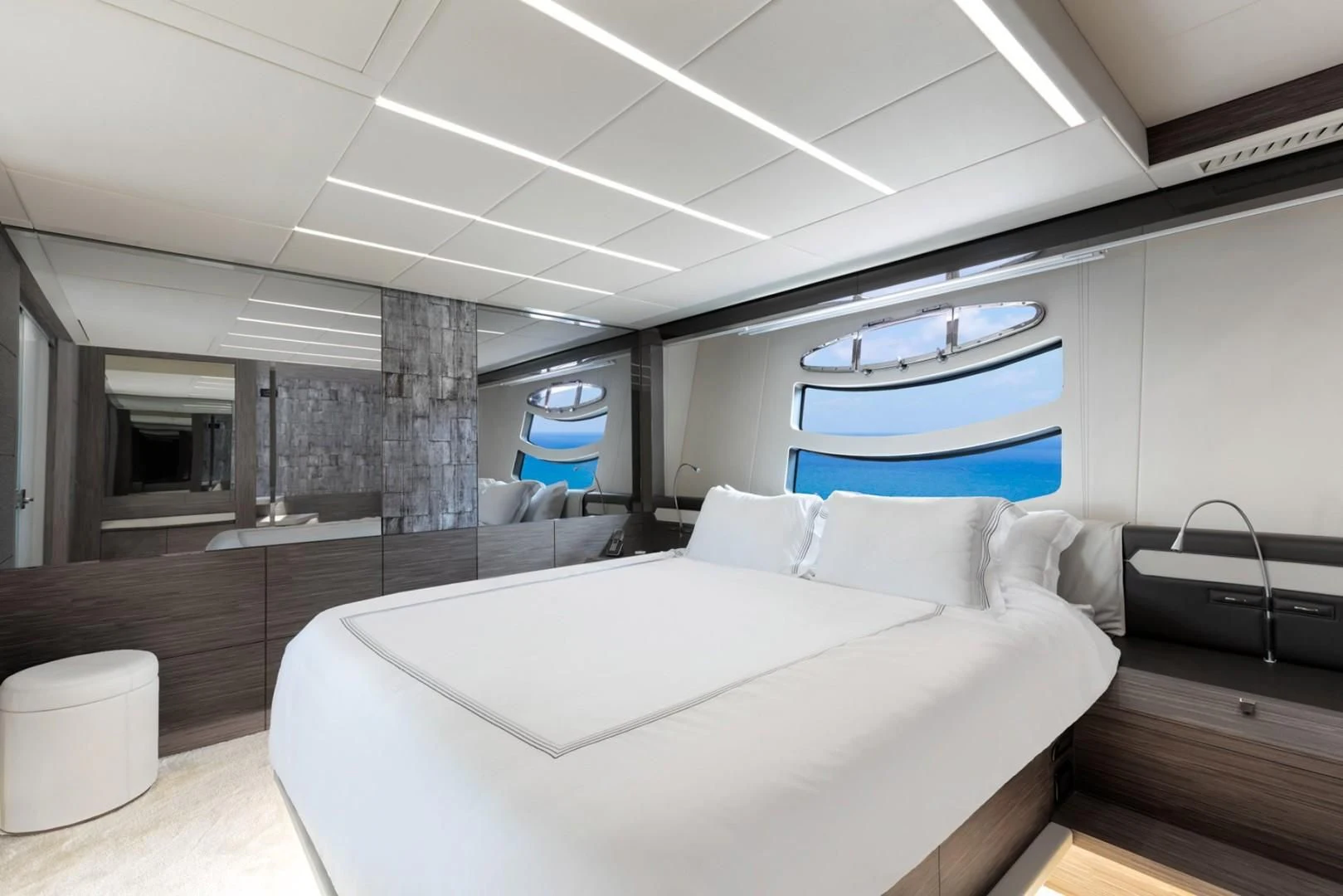 a room with a bed and a television aboard AFRICAN WILD DOG Yacht for Sale