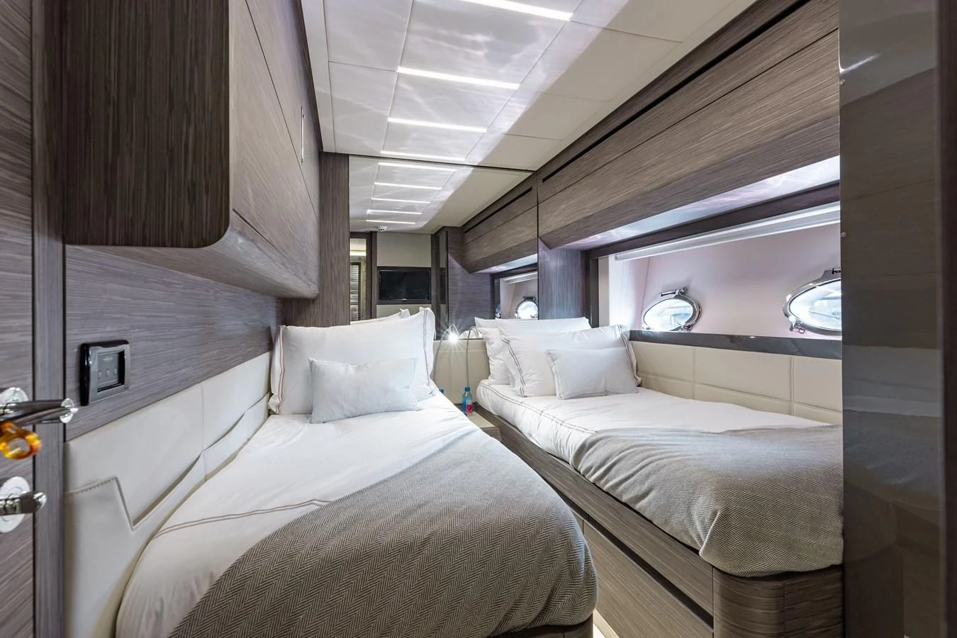 a room with two beds aboard AFRICAN WILD DOG Yacht for Sale