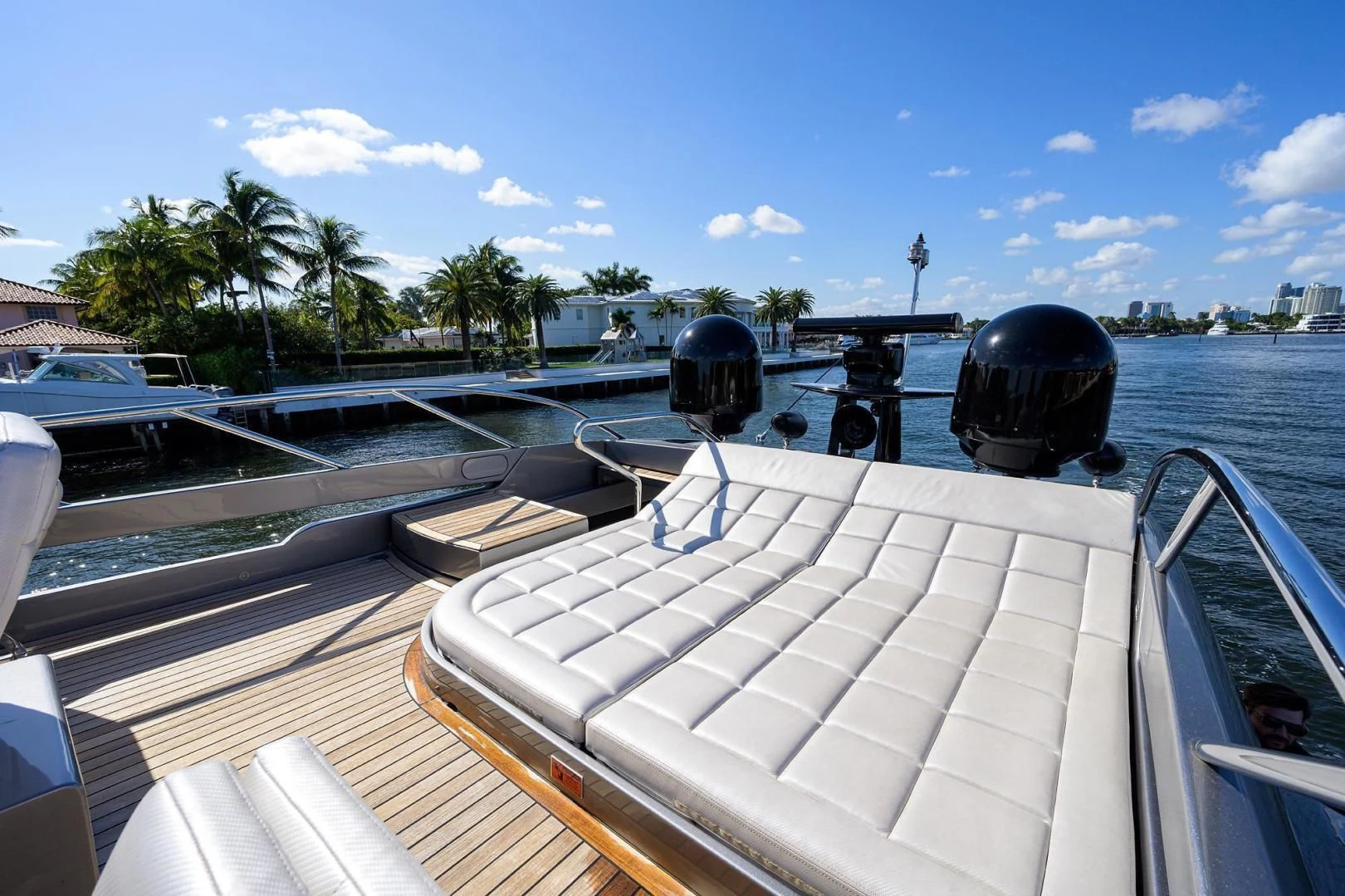 a boat with a helmet on the deck aboard AFRICAN WILD DOG Yacht for Sale