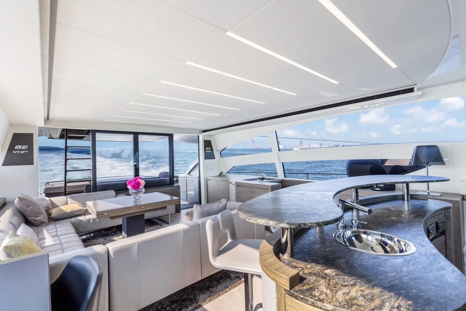 a room with a table and chairs aboard AFRICAN WILD DOG Yacht for Sale