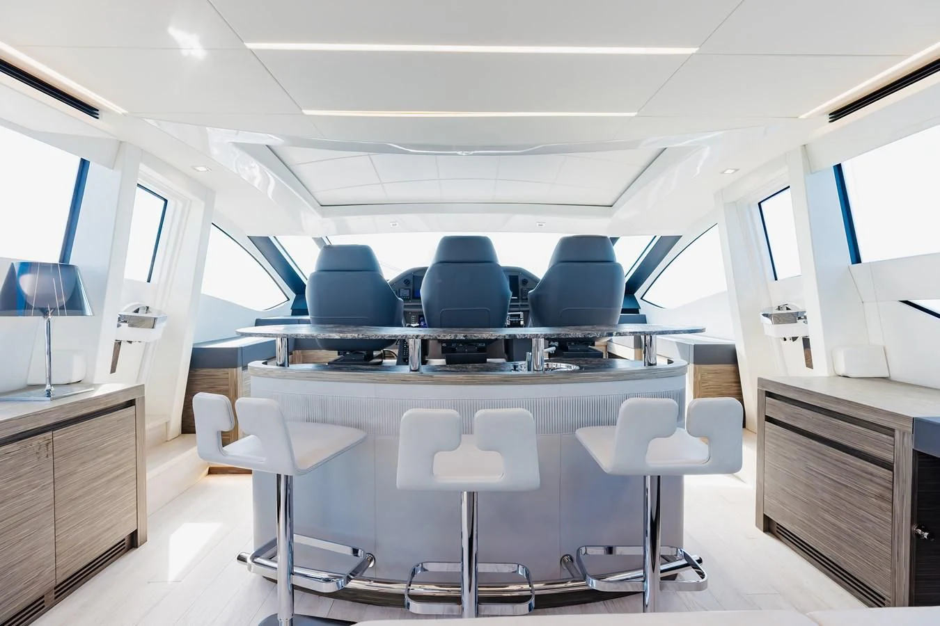 a room with a table and chairs aboard AFRICAN WILD DOG Yacht for Sale