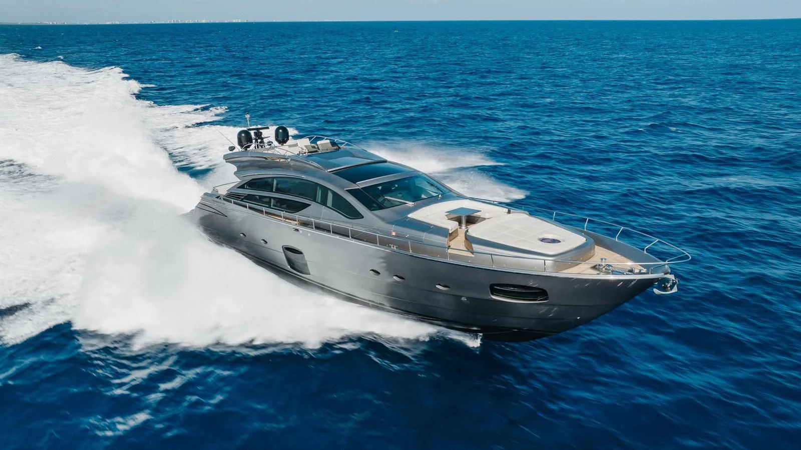 a white yacht in the ocean aboard AFRICAN WILD DOG Yacht for Sale
