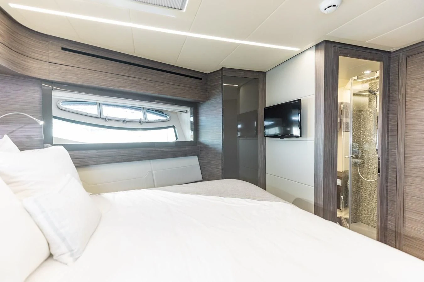 a bed in a room aboard AFRICAN WILD DOG Yacht for Sale