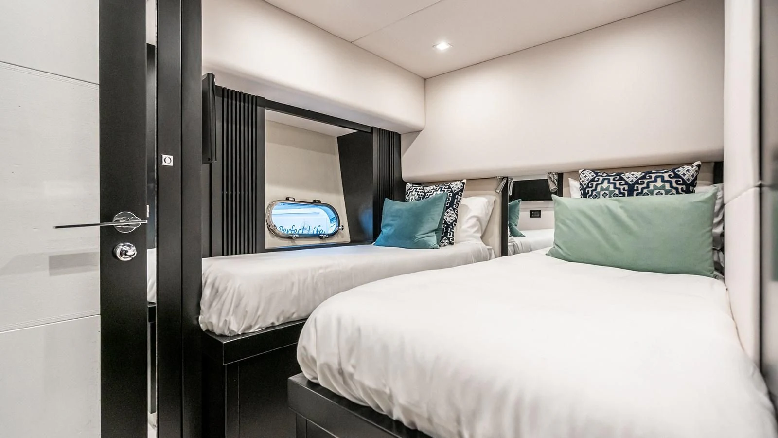 a room with two beds aboard NORMA JEAN Yacht for Sale