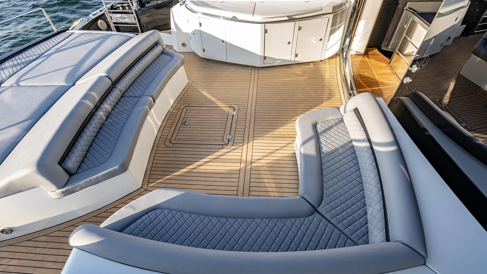 a bed with a blue sheet aboard NORMA JEAN Yacht for Sale