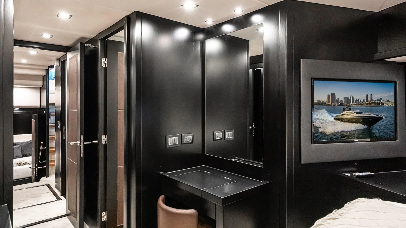 a room with a tv and a counter aboard NORMA JEAN Yacht for Sale