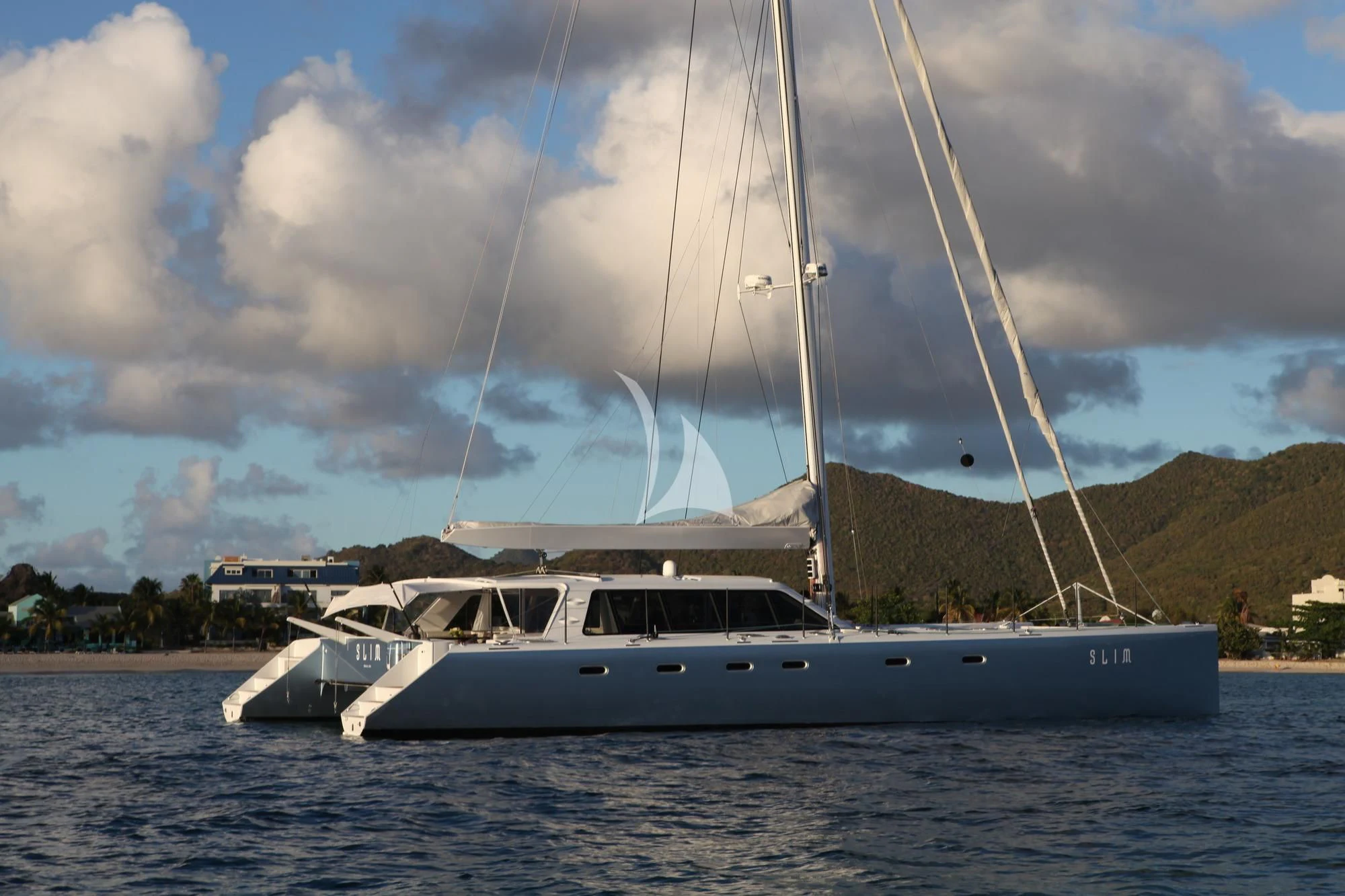 a boat on the water aboard SLIM Yacht for Charter