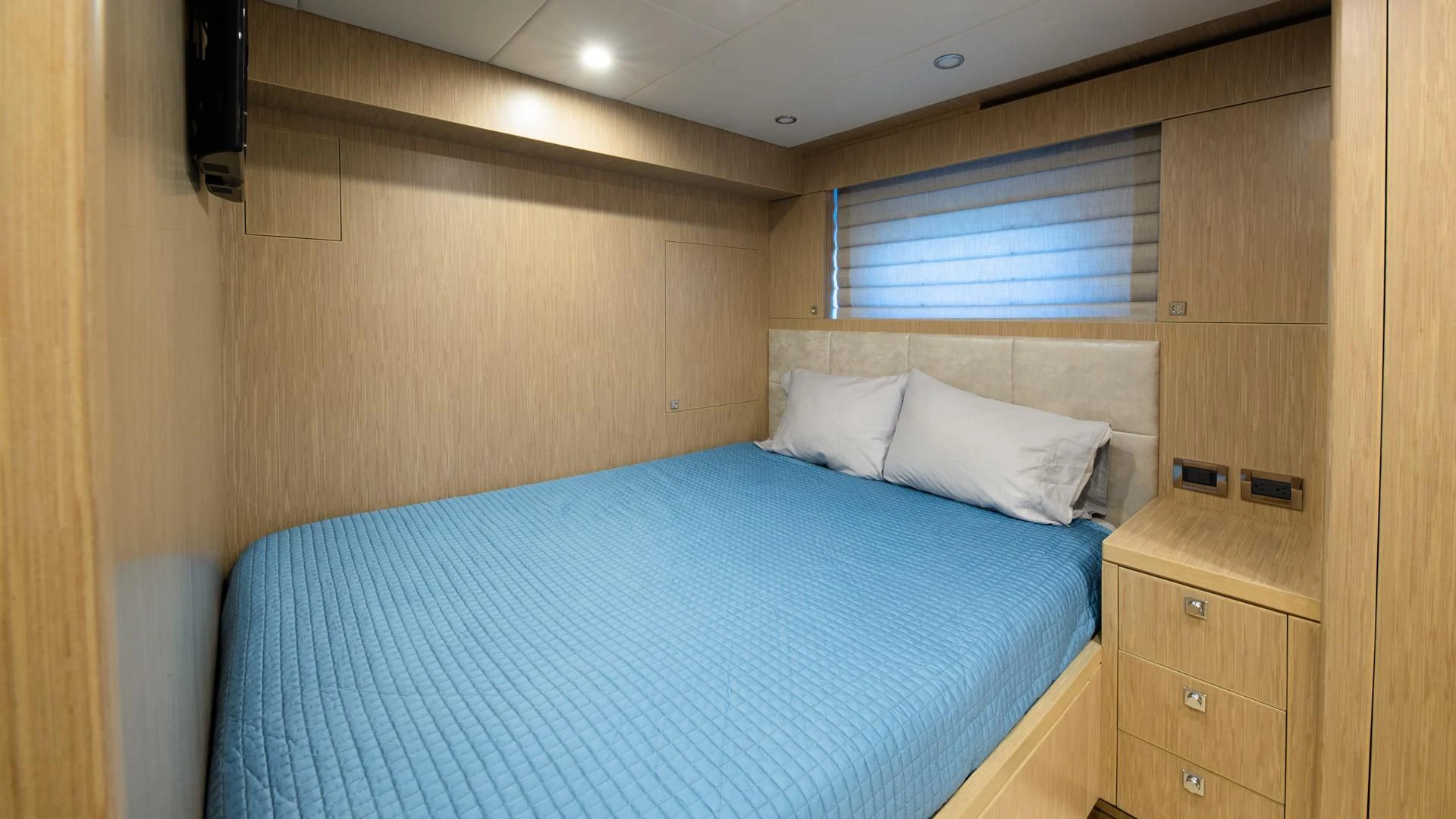 a bed in a room aboard RISK TAKER Yacht for Charter