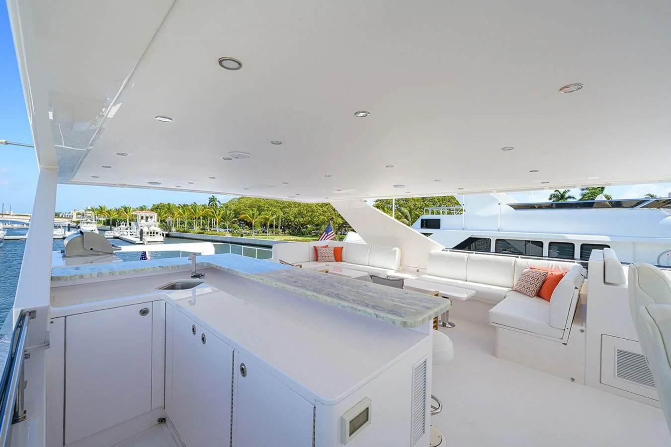 a room with a view of the water and the beach aboard RISK TAKER Yacht for Charter