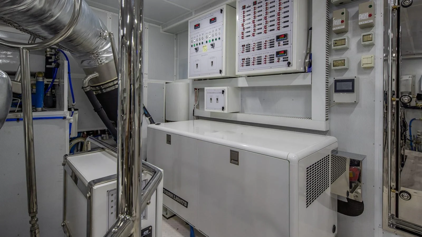 a room with several machines aboard RISK TAKER Yacht for Charter