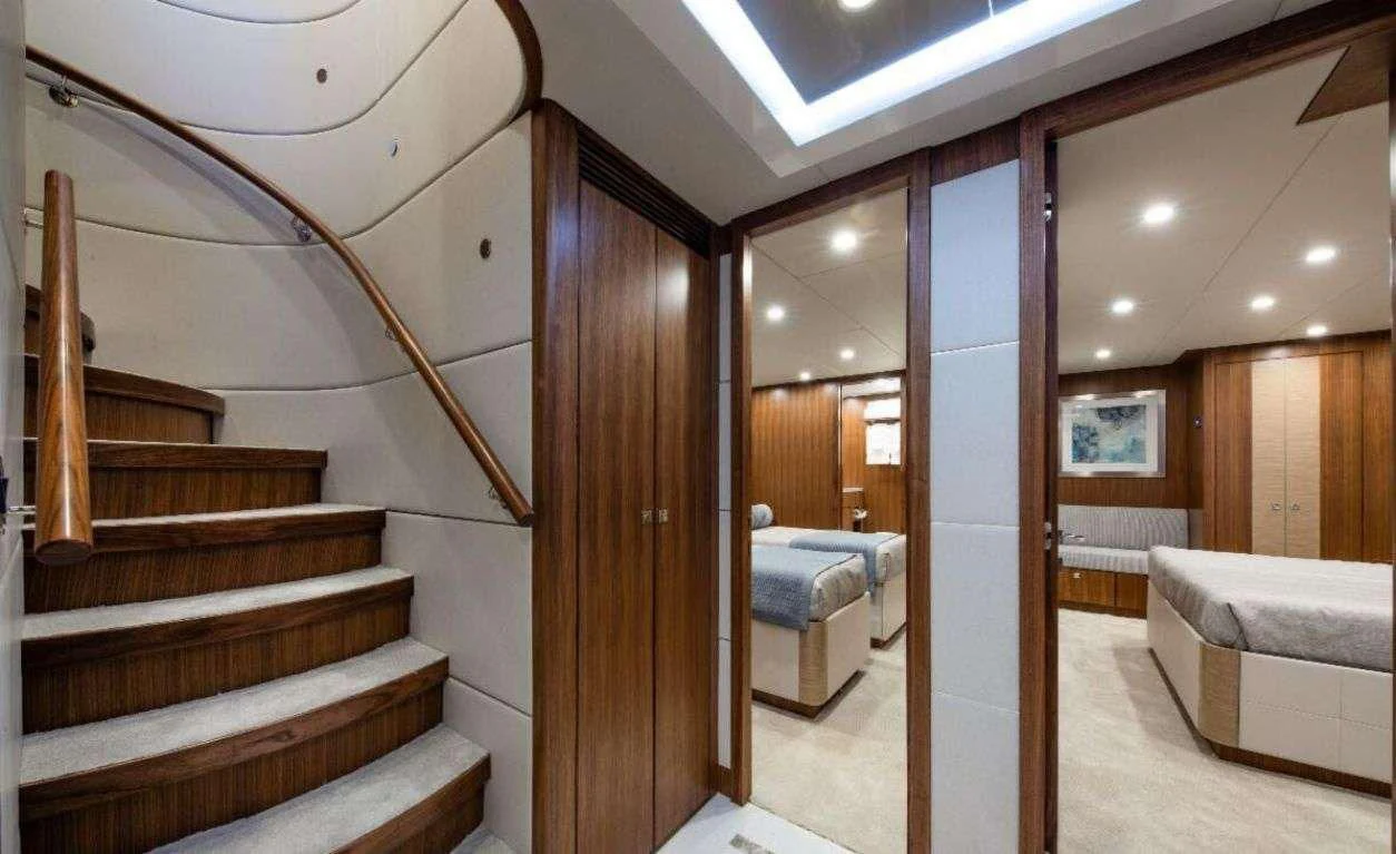 a staircase in a room aboard RISK TAKER Yacht for Charter