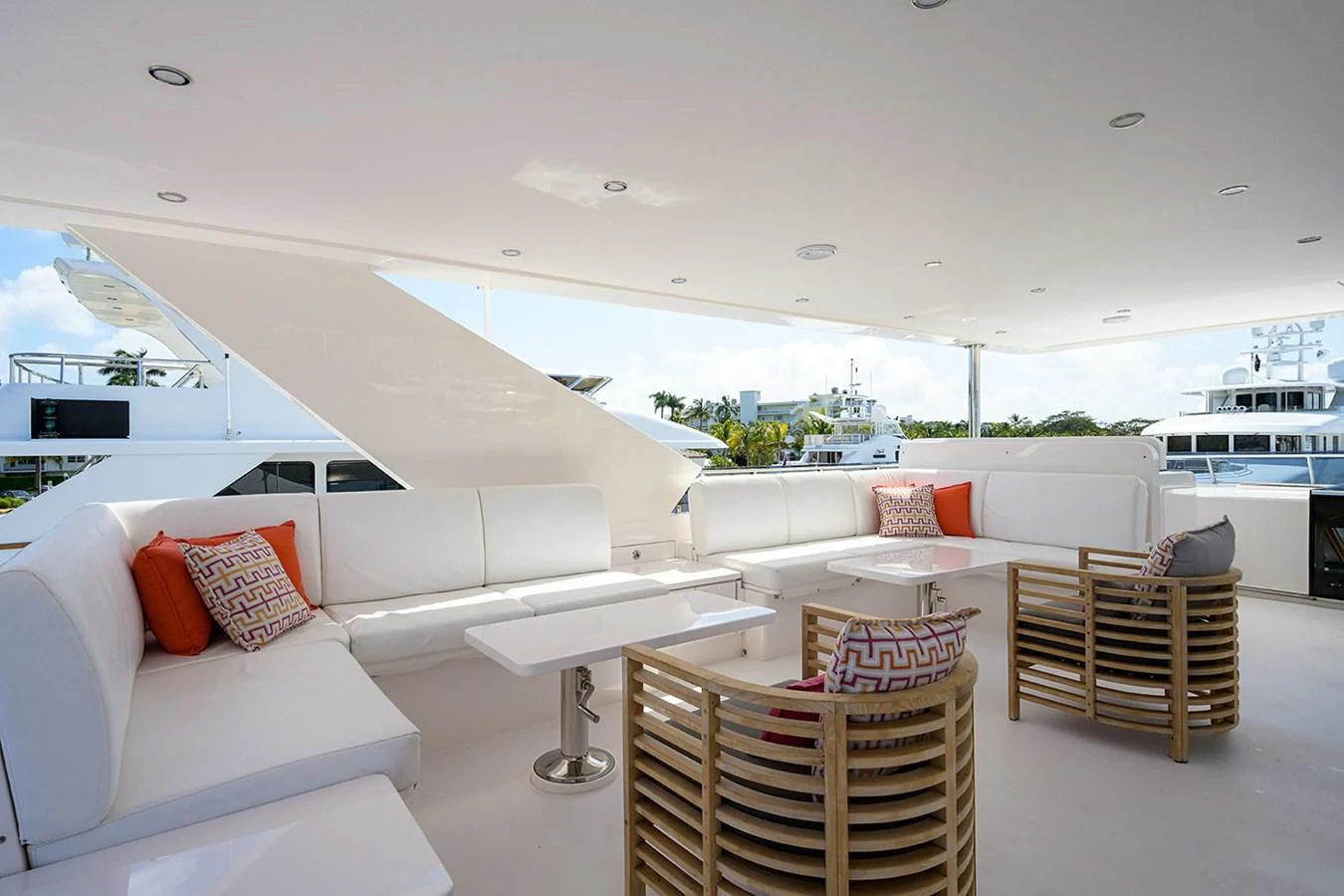 a room with a couch and a table and chairs aboard RISK TAKER Yacht for Charter