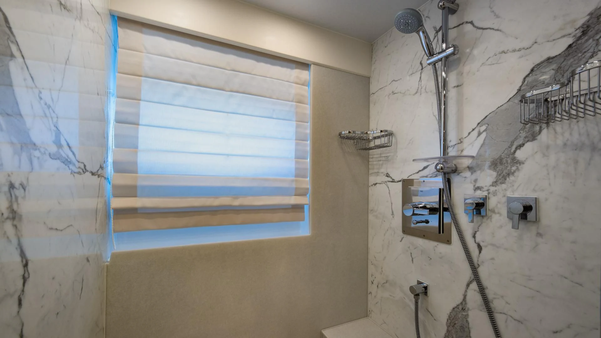 a window with a blue frame aboard RISK TAKER Yacht for Charter