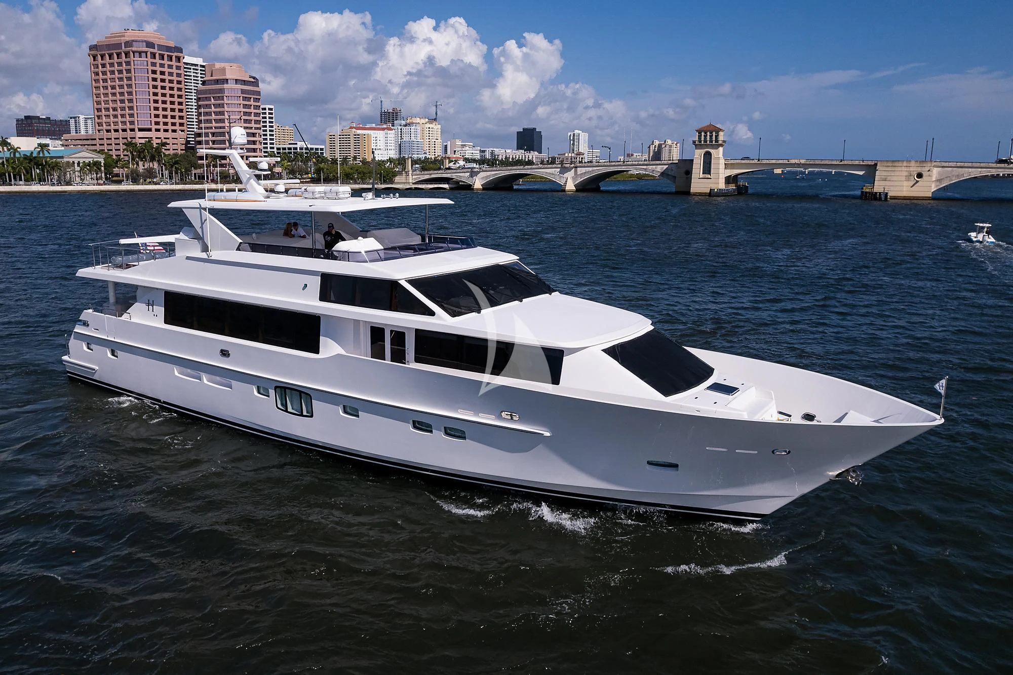 a white yacht in the water aboard RISK TAKER Yacht for Charter