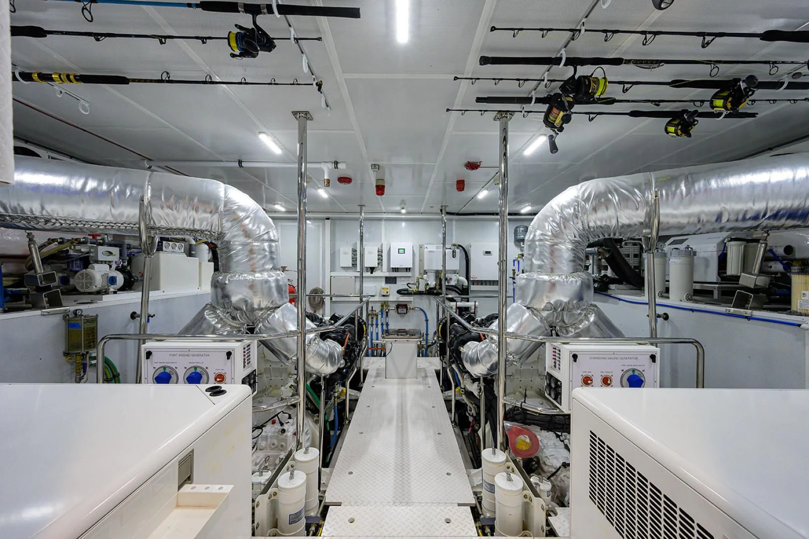 a room with white machines aboard RISK TAKER Yacht for Charter