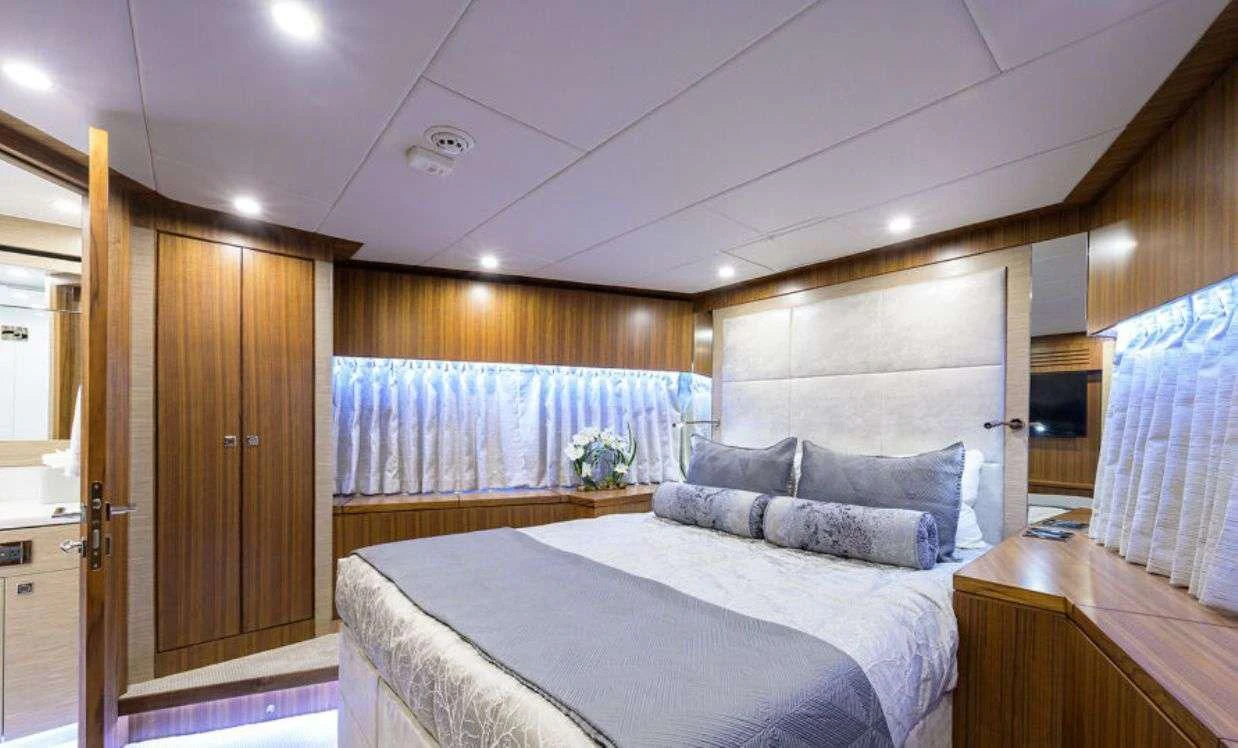 a bed in a room aboard RISK TAKER Yacht for Charter
