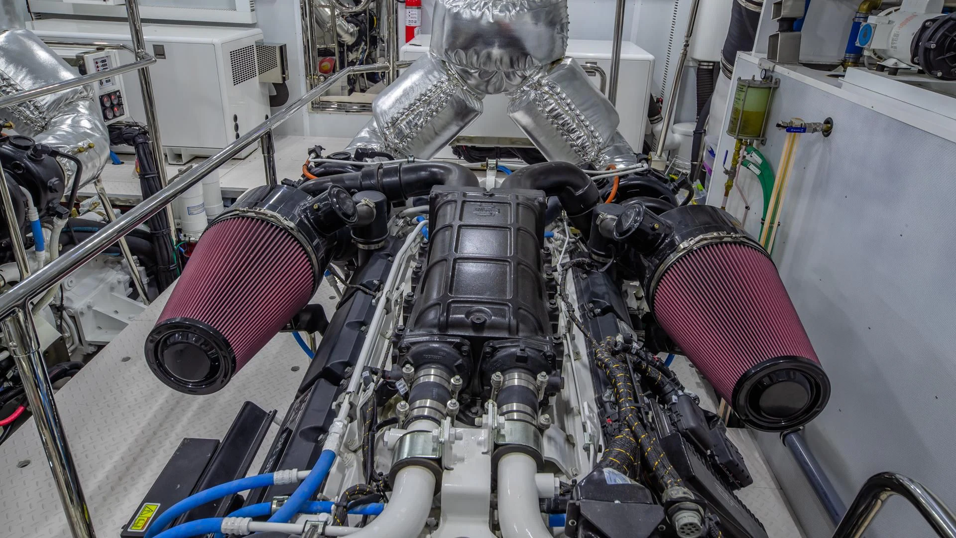 a machine with a large metal cylinder aboard RISK TAKER Yacht for Charter