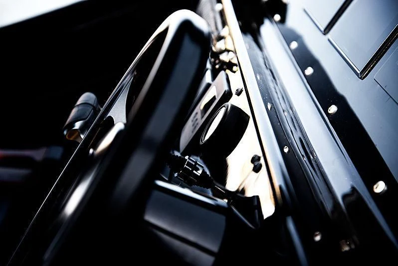 a close-up of a guitar aboard CARA MONTANA Yacht for Sale
