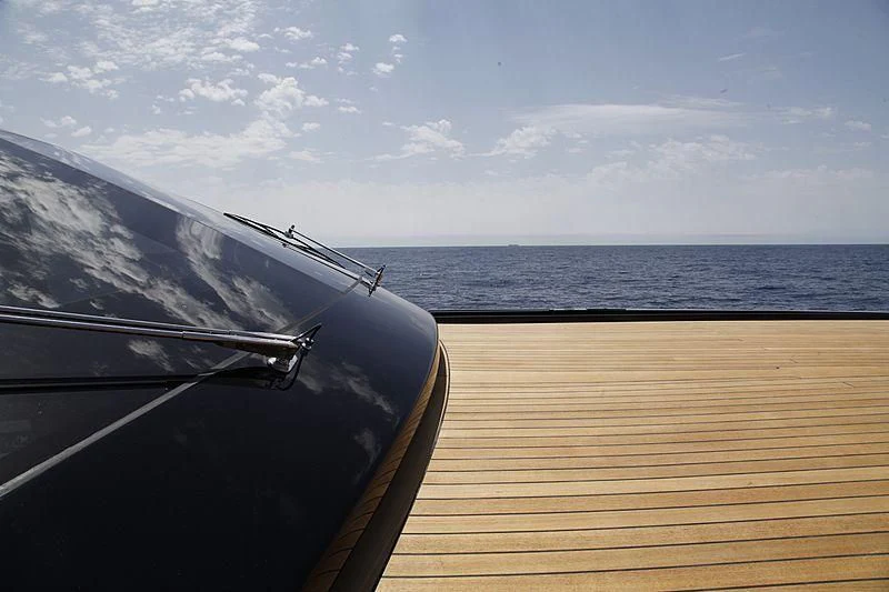 a snowy landscape with a boat on the water aboard CARA MONTANA Yacht for Sale