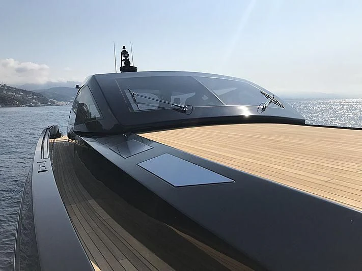 a boat with a statue on the front aboard CARA MONTANA Yacht for Sale