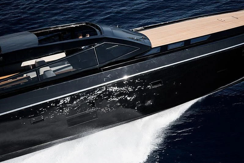 a black and silver car aboard CARA MONTANA Yacht for Sale