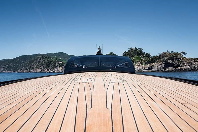 a car on a dock aboard CARA MONTANA Yacht for Sale