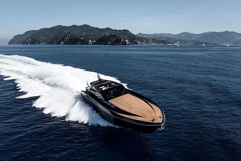 a speed boat on the water aboard CARA MONTANA Yacht for Sale