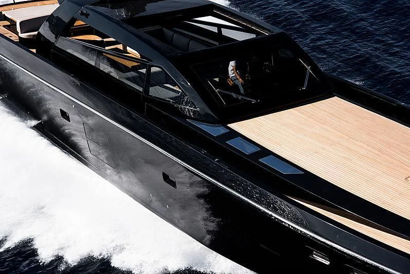 a person driving a boat aboard CARA MONTANA Yacht for Sale