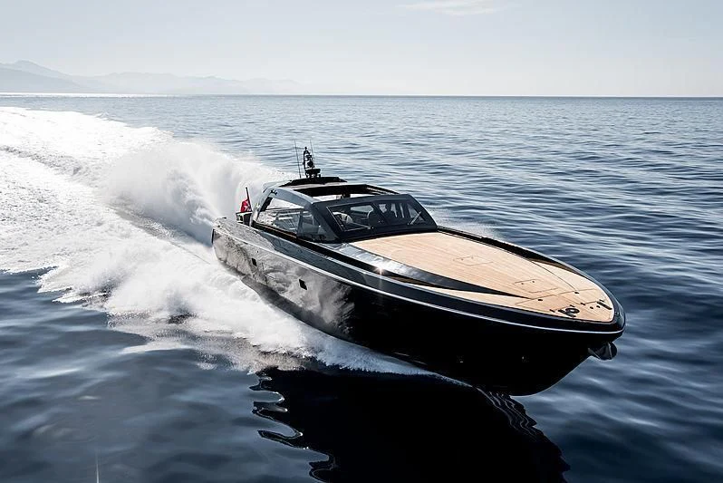 a speed boat splashing in the water aboard CARA MONTANA Yacht for Sale