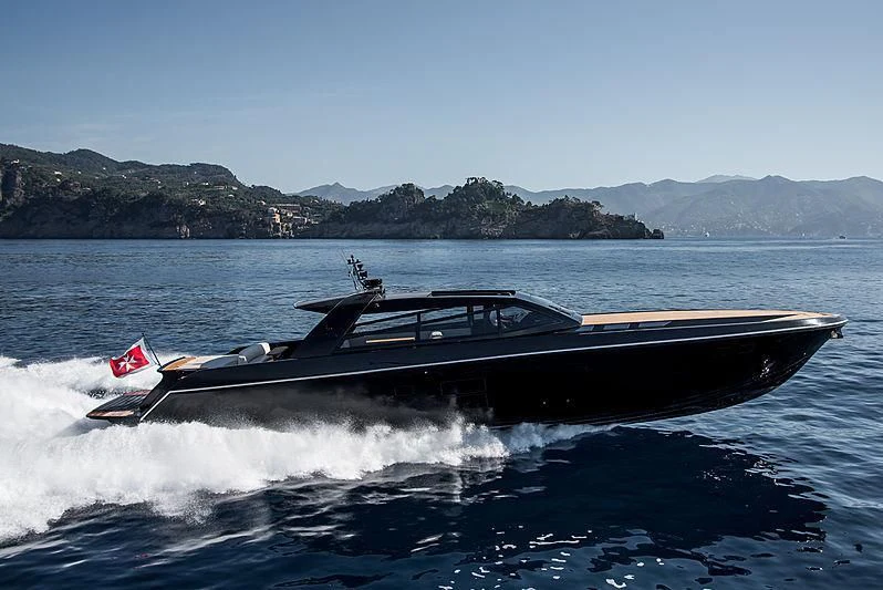 a speed boat splashing in the water aboard CARA MONTANA Yacht for Sale