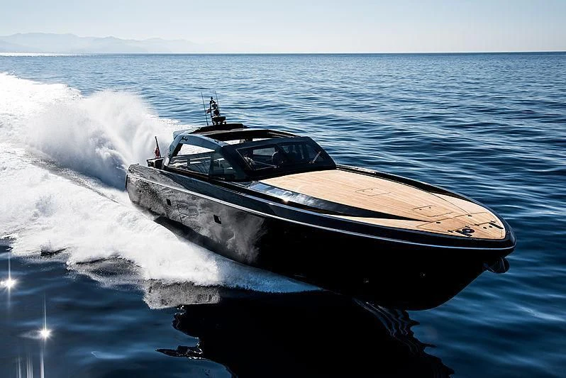 a car driving on water aboard CARA MONTANA Yacht for Sale