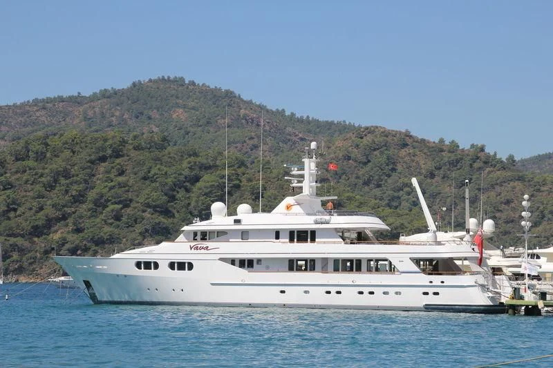 a large white boat in the water aboard VAVA Yacht for Sale