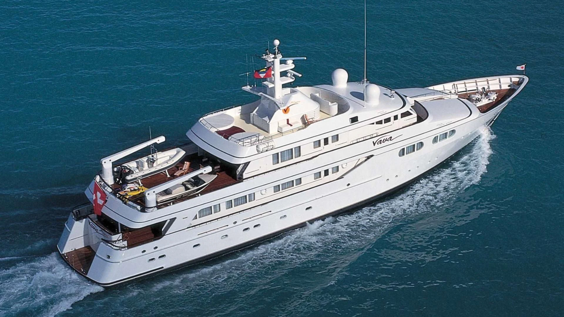 a large white ship in the water aboard VAVA Yacht for Sale