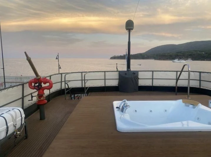 a dock with a fire hydrant and a lamp post on it aboard SAN GENNARO Yacht for Sale
