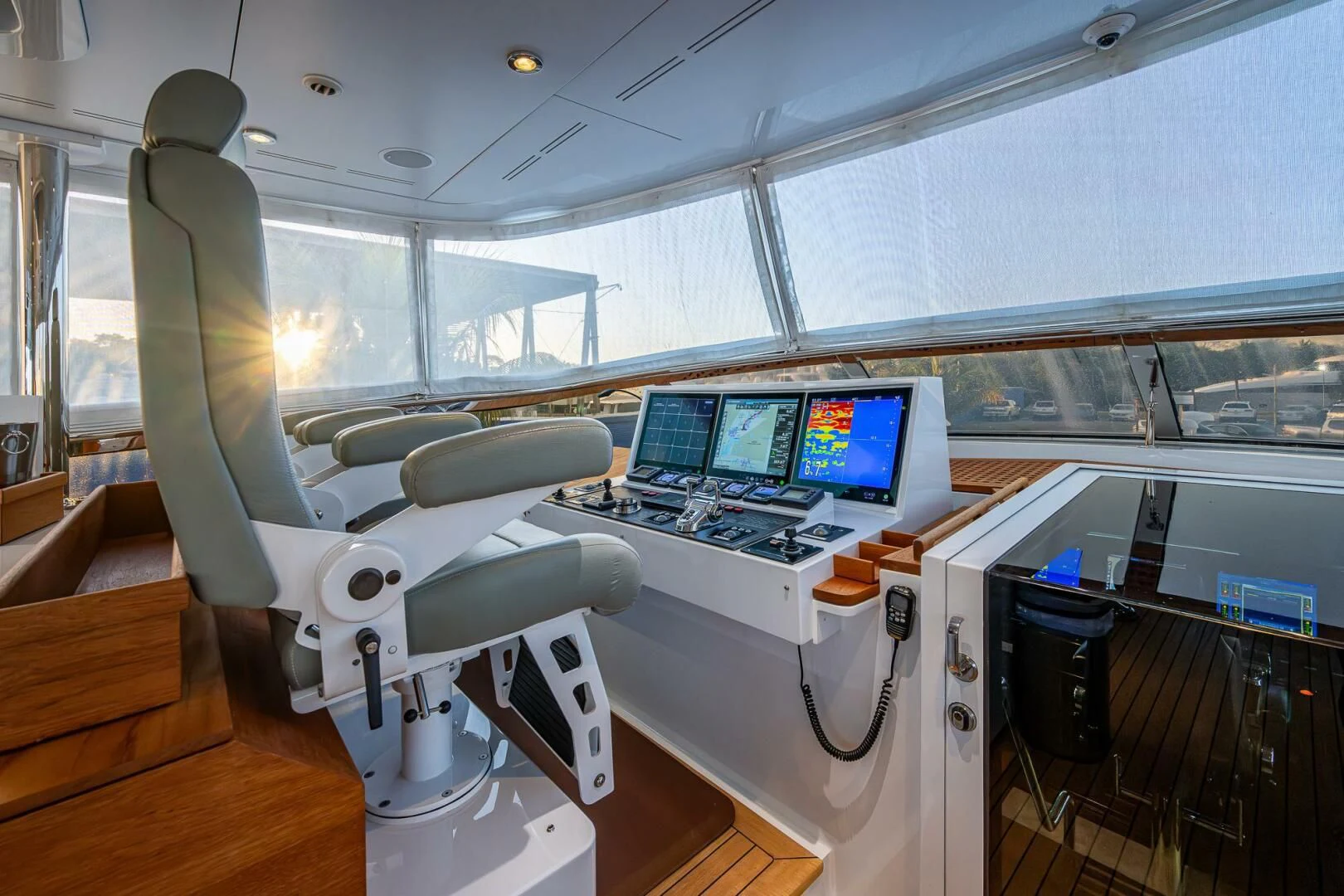 a room with a large window and a large white machine with a computer on it aboard KASHMIR Yacht for Charter
