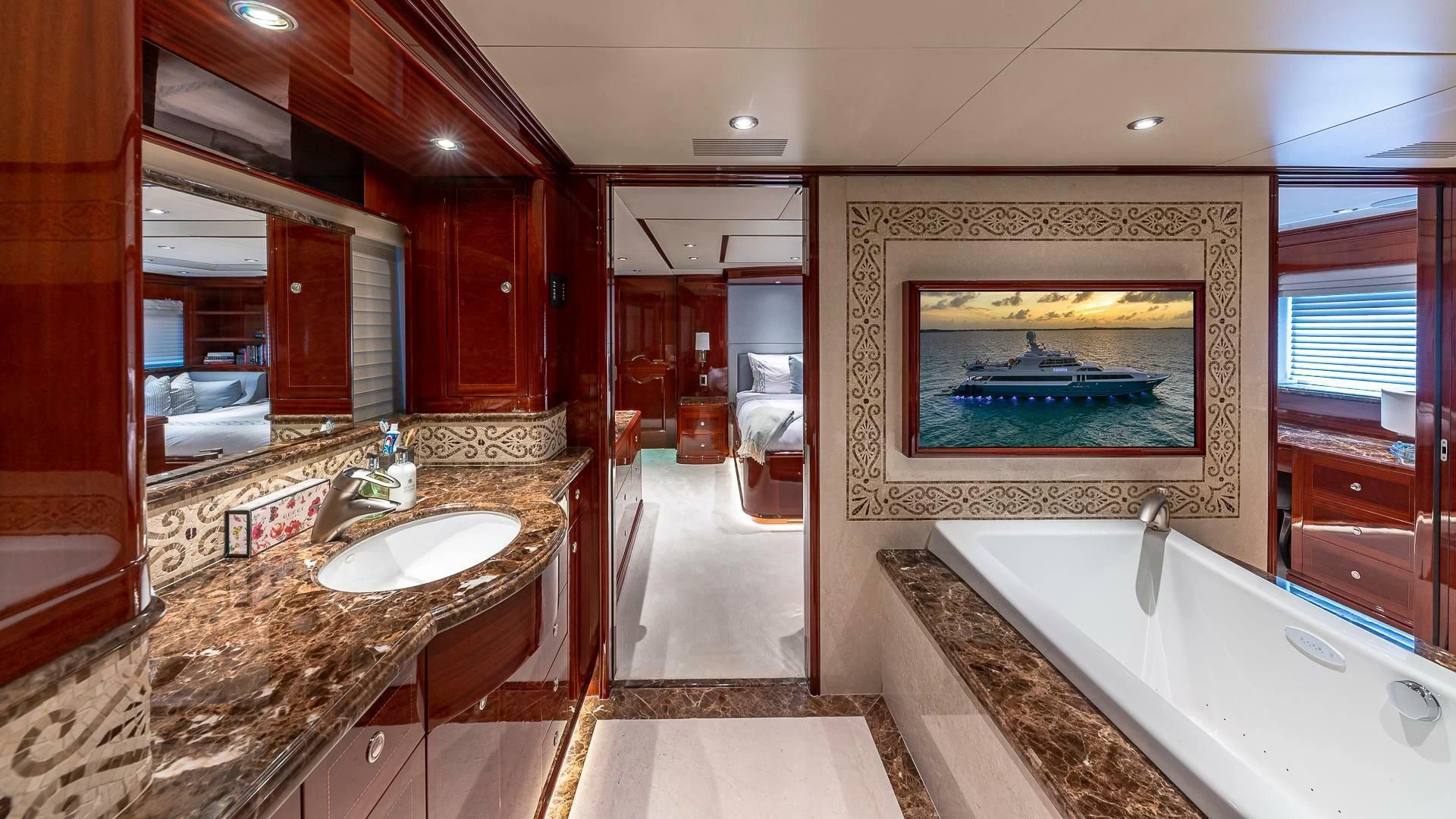a bathroom with a large marble countertop aboard KASHMIR Yacht for Charter
