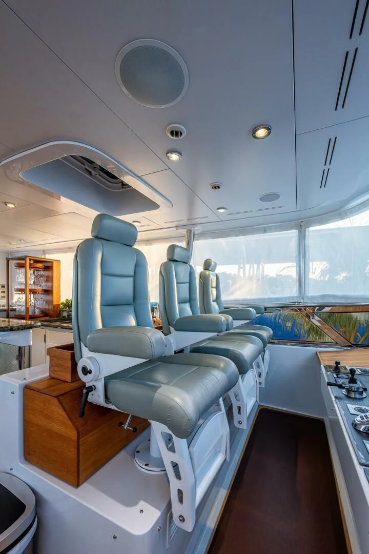 a room with a large window aboard KASHMIR Yacht for Charter